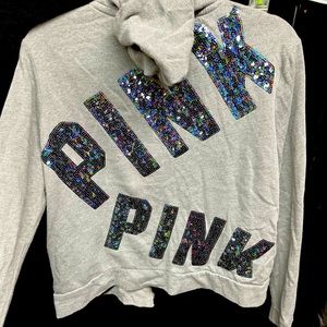 PINK gray lightweight zip hoodie with sequin holographic logo on back.